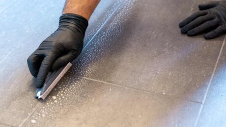 Person mopping a tile floor near Breese, Illinois (IL)